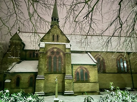 A church late at night with fresh snow