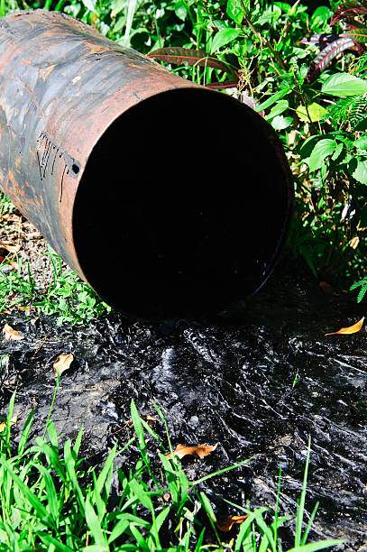 istock Oil spill drum pollution environmental disaster 182805652