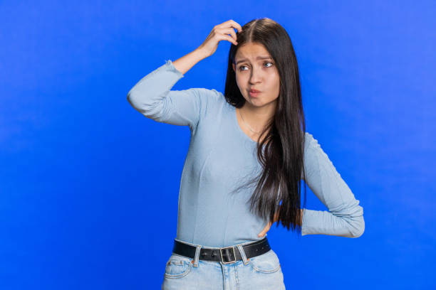 istock Confused woman girl feeling embarrassed about question having doubts no answer clueless uncertain 1828057426