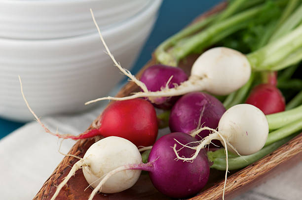 istock Stack of Multi-Colored Radishes in Wooden Bowl 182806106