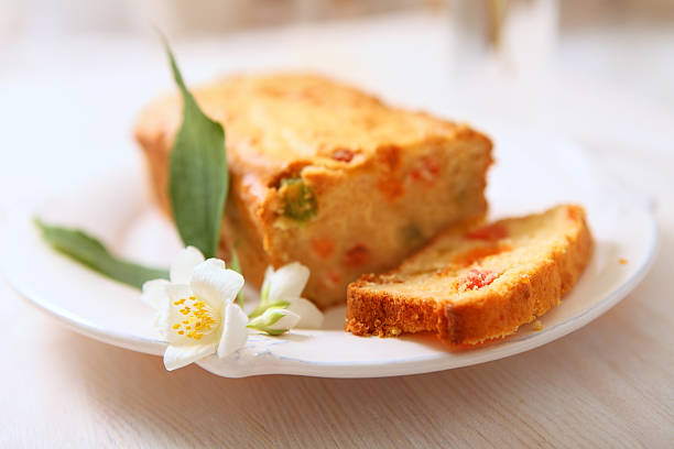 A freshly baked loaf of candied  fruitcake.