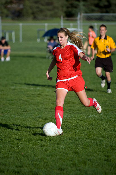 istock Female Soccer Player and Referee 182806750