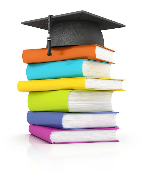 Photo of books with mortar board
