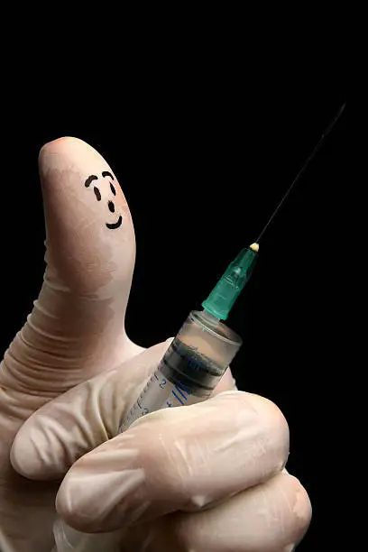 Dr. fingerman puppet (Face drawing on the thumb) injects.