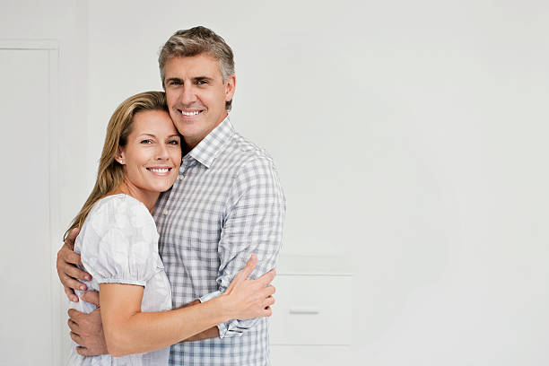 istock Man and Woman Embracing 182807346
