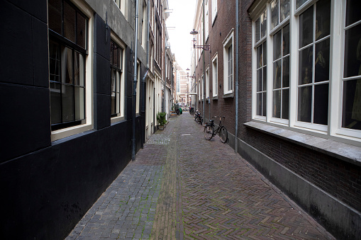 Narrow street with typical town houses in the old town of Lübeck, Germany