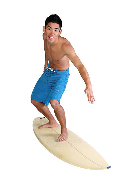 istock Isolated young adult surfing 182808065