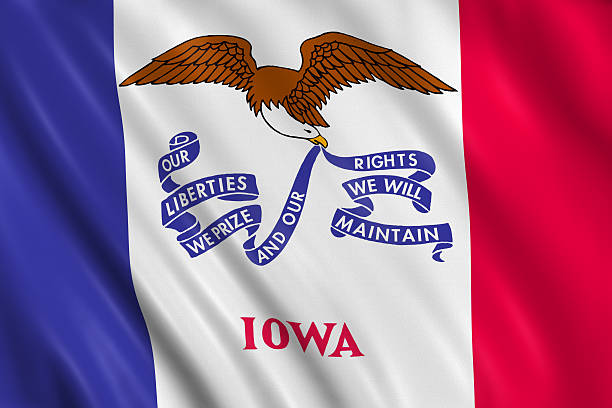 flag of iowa flag of iowa waving with highly detailed textile texture pattern iowa flag stock pictures, royalty-free photos & images