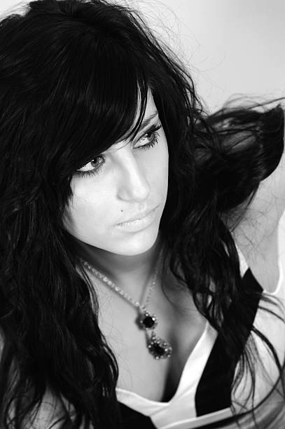 istock Young black-haired Woman in Dreams Top View Duotone 182808456