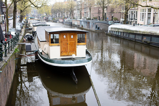 Boats moored on an Amsterdam canal