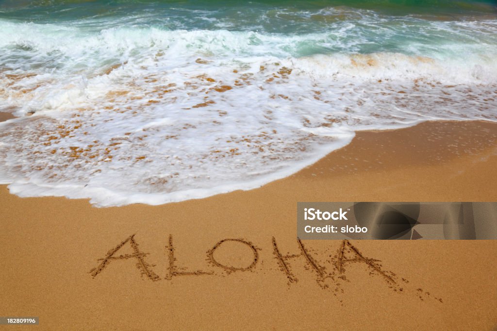 Aloha en la playa de arena - Foto de stock de Aloha - Palabra hawaiana libre de derechos