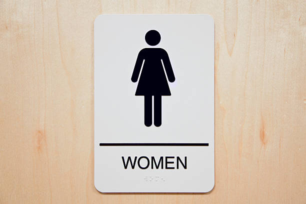 Rectangular sign for a women's restroom stock photo