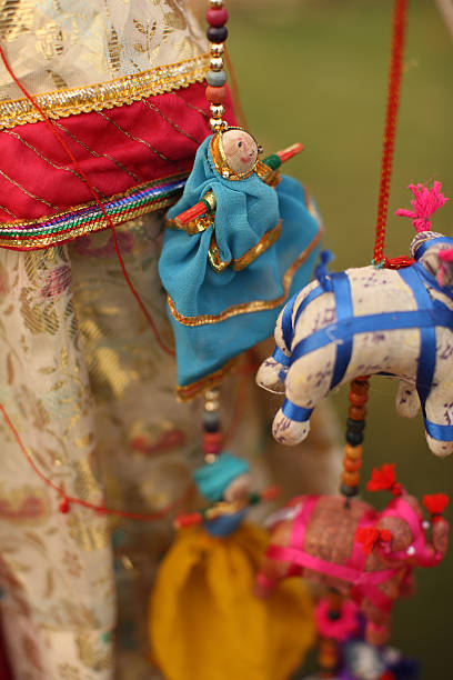 Indian Folk Dolls Indian puppet dolls in the outdoor market in Agra. doll puppet indian culture small stock pictures, royalty-free photos & images