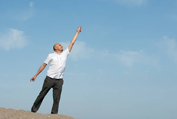 istock young man goes to the sky 182809498