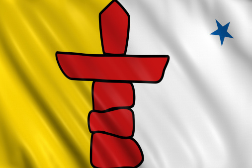 flag of nunavut waving with highly detailed textile texture pattern