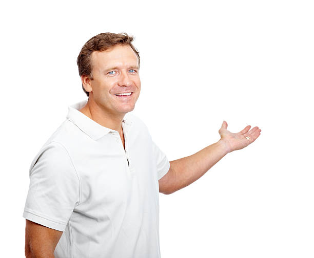 istock Smiling mature man showing something on white background 182810450
