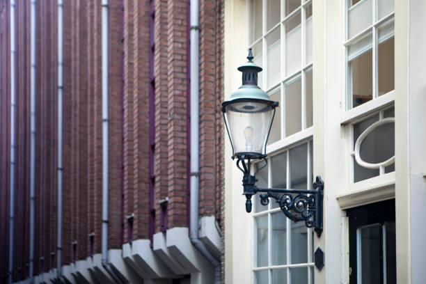istock Street light on the side of a building 1828106057
