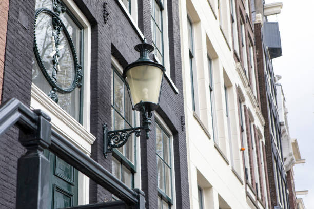 istock Street light on the side of a building 1828106572