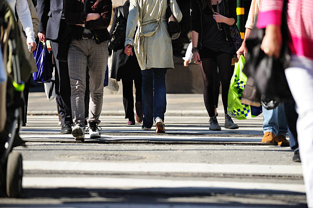 istock People crossing street 182811073
