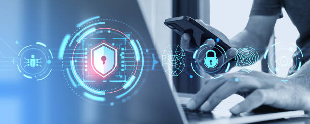 istock Man using phone and laptop, cybersecurity and biometric scanning with padlock 1828113368