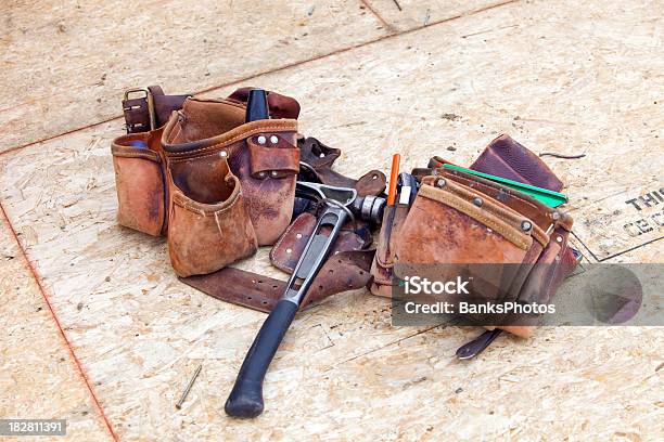 Construction Workers Leather Tool Belt At Rest On Osb Floor Stock Photo - Download Image Now