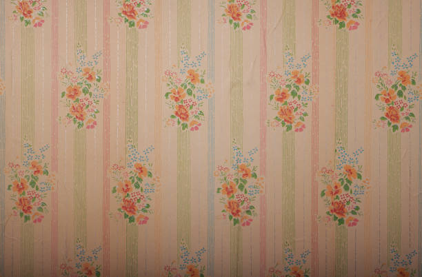istock Old wallpaper on the wall. Old wallpaper for texture or background. 1828120773