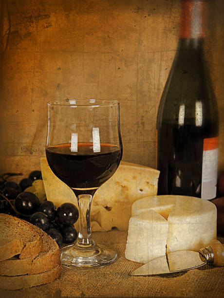 istock Wine, cheese and grapes with vintage look 182812707