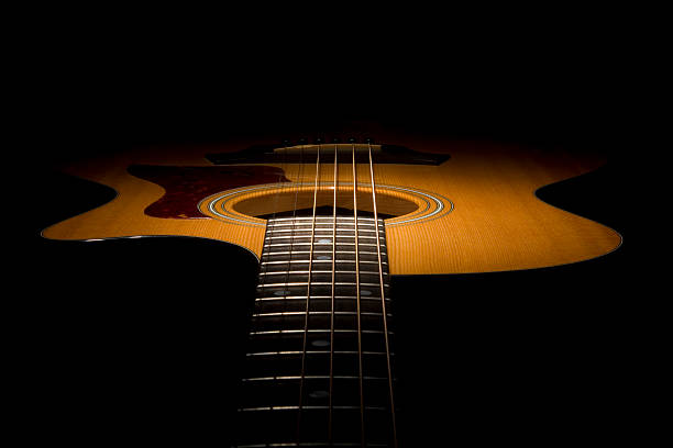 chitarra in ombra - ponticello di strumento musicale foto e immagini stock