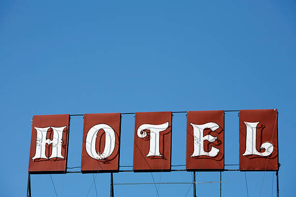 istock Retro Hotel Sign With Blue Sky 182813346