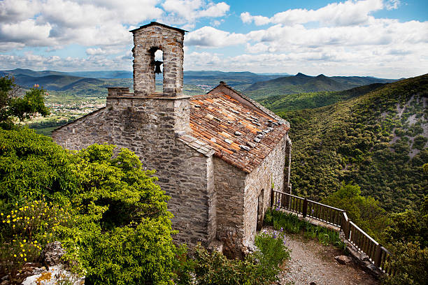 St Michel chapel "St-Michel de Mourcairol. Saint-Michel's chapel is located at the ruins of Mercoirol Castle, which dates back as early as 990 AD, appearing in the last will and testament of the Viscount of B&#233;ziers." beziers stock pictures, royalty-free photos & images