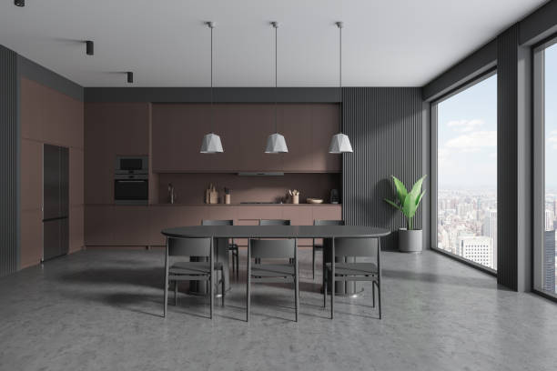 istock Gray and brown kitchen interior with cabinets and dining table 1828135636