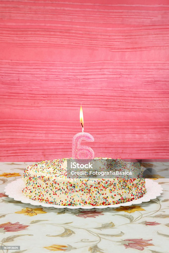 Her sixth birthday Birthday cake with number 6 candle for her birthday Birthday Stock Photo