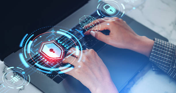 istock Woman finger typing on laptop, cybersecurity and protection, biometric data 1828138860