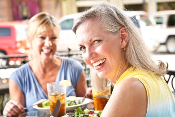 istock Happy Women Having Lunch at Outside Cafe 182813985
