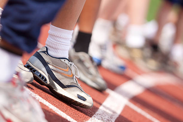 istock Boys running shoe at starting line 182814392