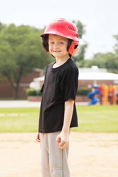 istock Boy on Baseball Field Wearing a Helmet 182814962