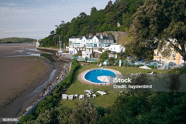 Hotel And Pool By The Sea Stock Photo - Download Image Now - Portmeirion, Hotel, Village