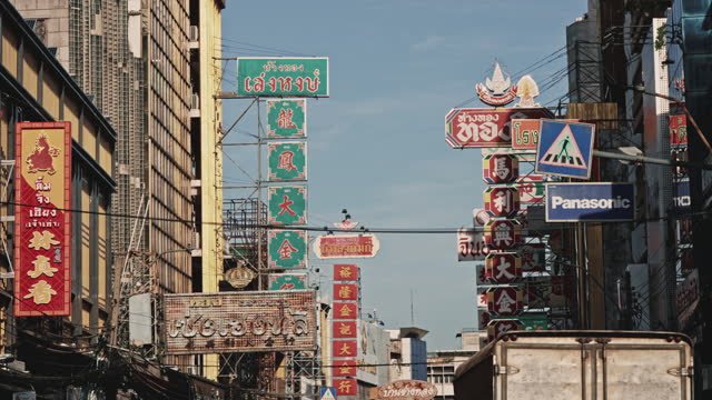 Shop sign and Traffic on Yaowarat Road
