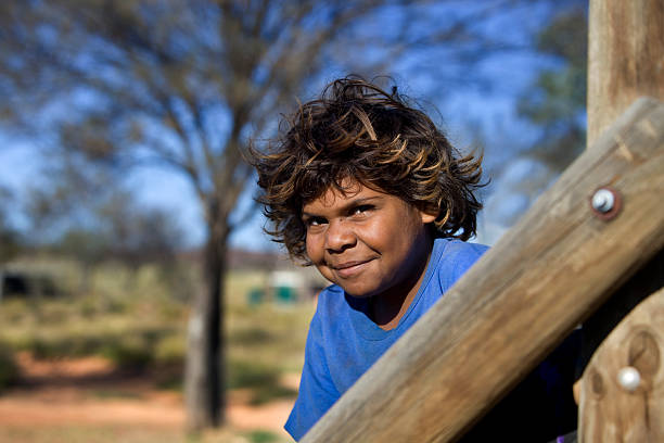 Aboriginal Child Indigenous girl smiling at the camera indegious culture stock pictures, royalty-free photos & images