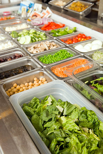 istock Salad Bar with Fresh Lettuce and Toppings 182815594