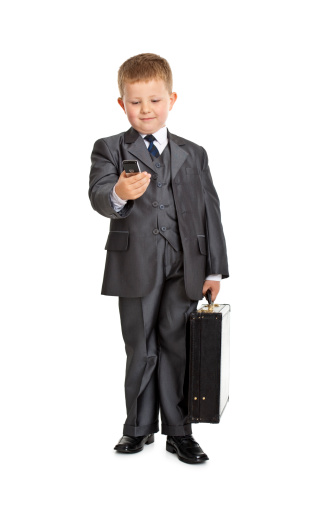 small boy looking like businessman isolated on white