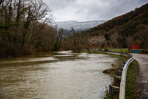 Chanaz/Chindrieux, Savoie, France, December 2, 2023, Following heavy rain, flooding of the plain between Chanaz and Chindrieux, from Lac du Bourget to the Rhône River.\nflooded roads.\nThe Savière Canal overflows into the Rhône River and the Lac du Bourget, the direction of flow (usually, the lake flows into the Rhône) has reversed and caused the level of the Lac du Bourget to rise due to the Rhône in raw.