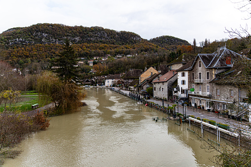 Chanaz/Chindrieux, Savoie, France, December 2, 2023, Following heavy rain, flooding of the plain between Chanaz and Chindrieux, from Lac du Bourget to the Rhône River.\nflooded roads.\nThe Savière Canal overflows into the Rhône River and the Lac du Bourget, the direction of flow (usually, the lake flows into the Rhône) has reversed and caused the level of the Lac du Bourget to rise due to the Rhône in raw.