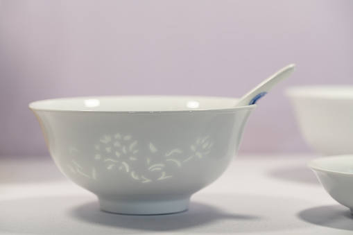 Sugar bowl decorated with patterns on a white background