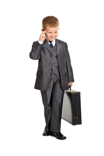 small boy  looking like businessman isolated on white