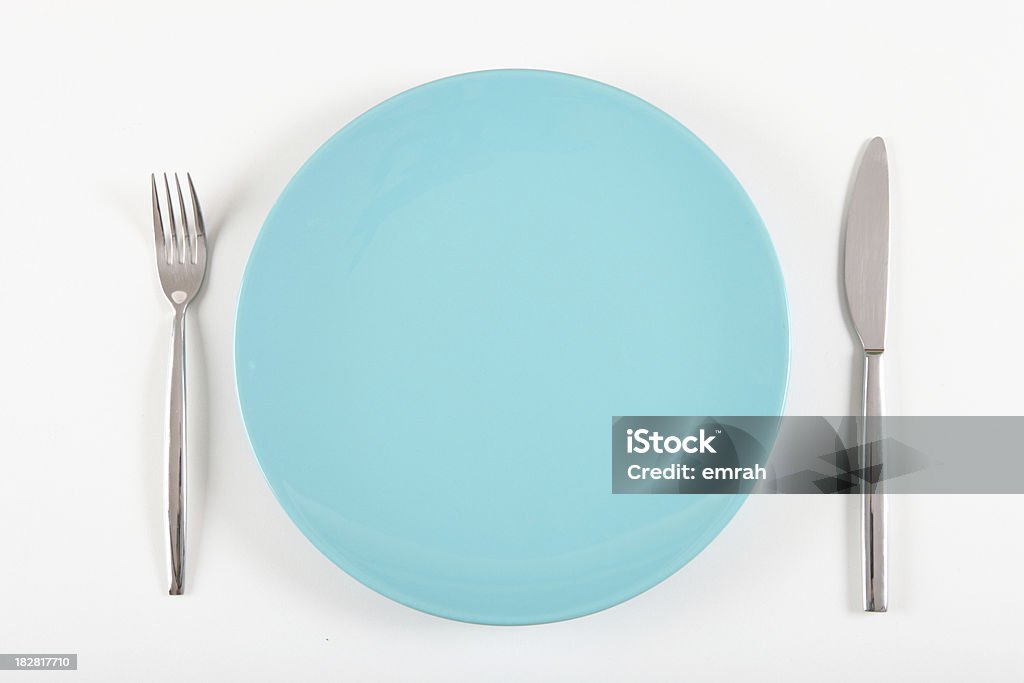 Синий тарелка, вилка и нож - Стоковые фото Без людей роялти-фри