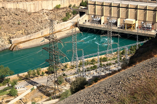 Kurpsai Hydro station. Lower Naryn River Canyon near Toktogul in Kyrgyzstan. a Hydroelectric dam in central asia