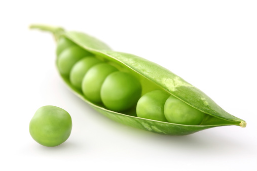 Fresh green pea in the pod isolated on white background
