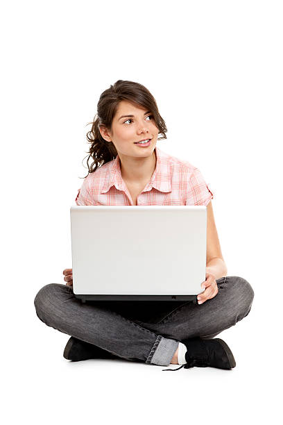 istock young attractive woman with laptop 182819013