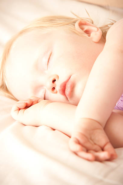 istock Baby girl sleeping 182819912